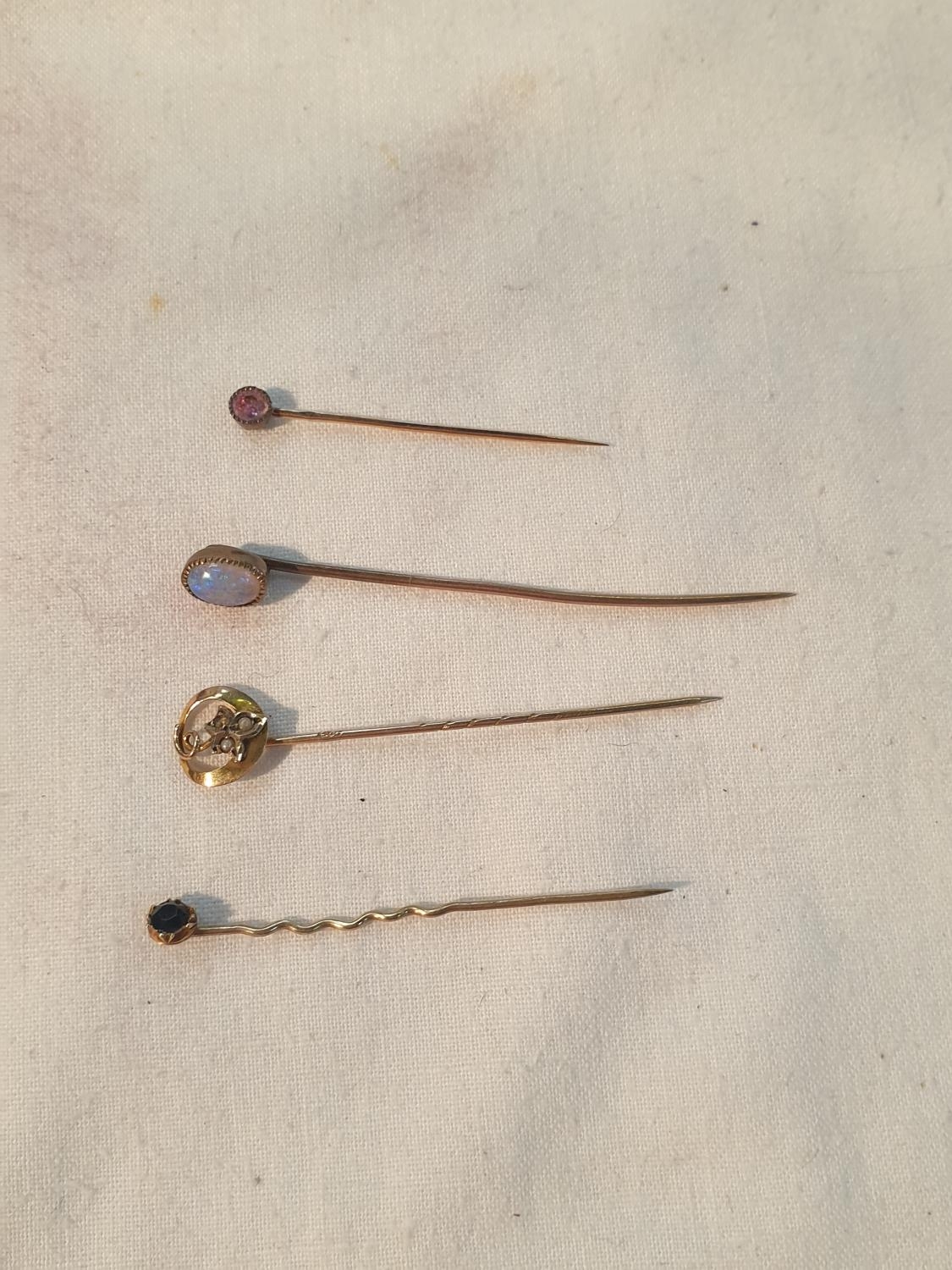 Four Victorian 9ct Gold & Plated Stick Pins in Case.