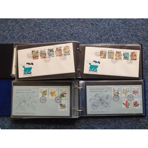 109 - 2 FDC Albums containing a selection of 77 covers principally from Kiribati 1986-96 (60) and The Solo... 