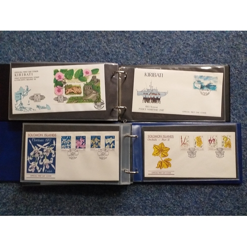 109 - 2 FDC Albums containing a selection of 77 covers principally from Kiribati 1986-96 (60) and The Solo... 