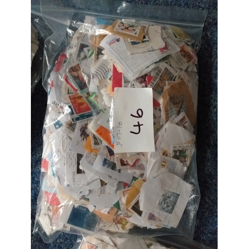 46 - Plastic bag containing 500g min of world kiloware on paper - most periods covered but mainly modern ... 