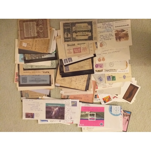 98 - Envelope/packet containing World Covers with the odd banknote thrown in - much early and also incl 3... 