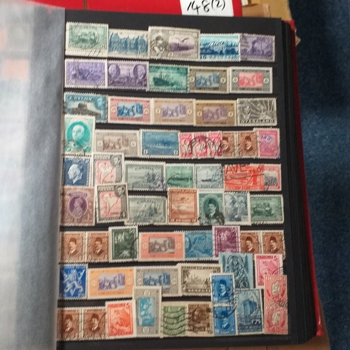 148 - 2 x 32/64 page/side red stock books housing a useful selection of mainly all world issues MNH/mint i... 