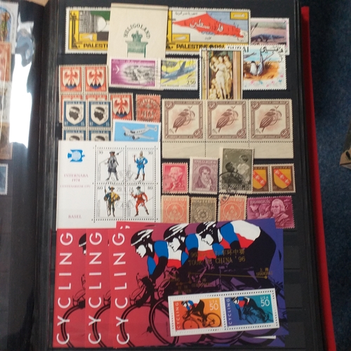 148 - 2 x 32/64 page/side red stock books housing a useful selection of mainly all world issues MNH/mint i... 