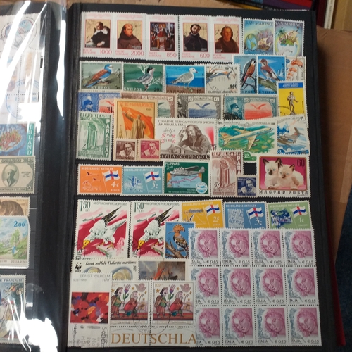 148 - 2 x 32/64 page/side red stock books housing a useful selection of mainly all world issues MNH/mint i... 