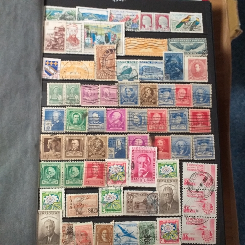 148 - 2 x 32/64 page/side red stock books housing a useful selection of mainly all world issues MNH/mint i... 