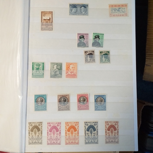 155 - Red PARAGON 32/64 page/side Stock book of world stamps, largely Europe and USA mostly mint/un-mounte... 