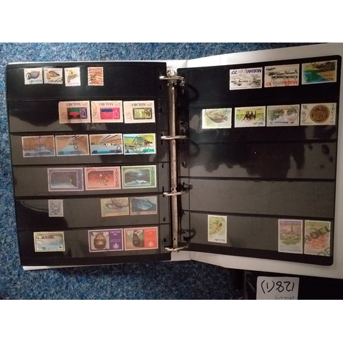 128 - World collection in 2 large 4 ring binders.  Mint/used issues on Hagners/lighthouse/vario plastic st... 