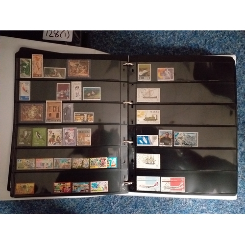 128 - World collection in 2 large 4 ring binders.  Mint/used issues on Hagners/lighthouse/vario plastic st... 