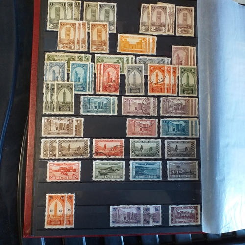 240 - Red 30 page stock book  housing a comprehenive collection of Morocco, mostly un-mounted mint.  Viewi... 