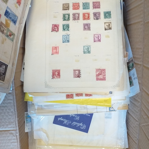 41 - Glory box with 100's of packets of stamps on album pages, wide selection viewing required.