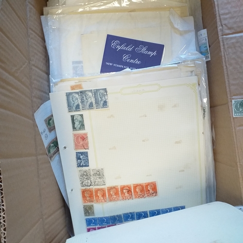 41 - Glory box with 100's of packets of stamps on album pages, wide selection viewing required.