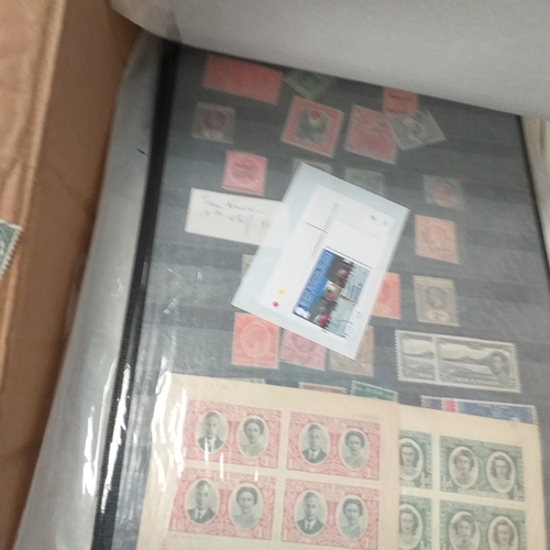 41 - Glory box with 100's of packets of stamps on album pages, wide selection viewing required.