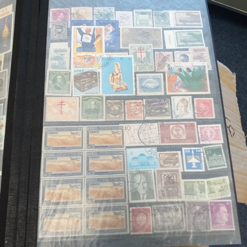 56 - Box of albums/stockbooks (Irreland in 16 pages stock book, World in 32 page stock book,, world in gr... 