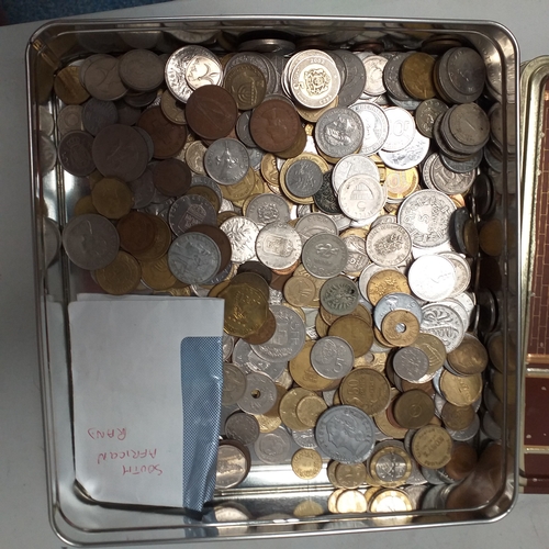22 - Tin of world coins - 2.5kg approimately
