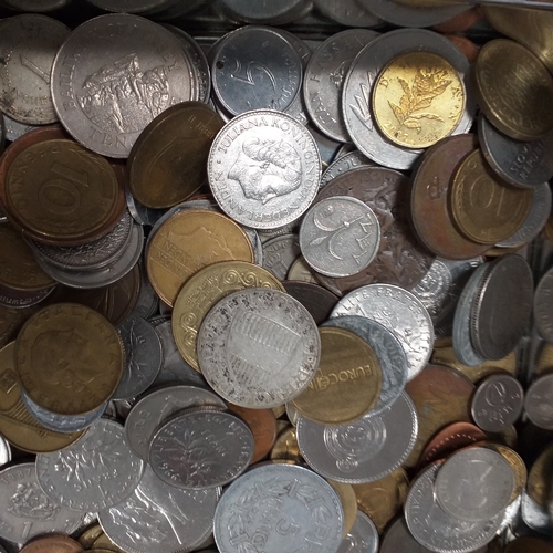 22 - Tin of world coins - 2.5kg approimately