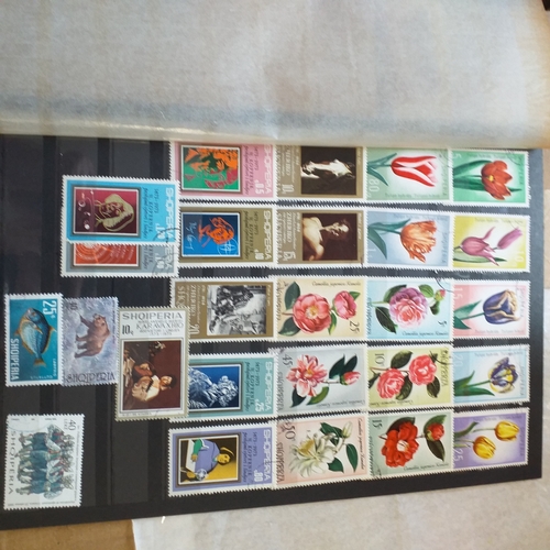 153 - Albania small collection on 13 album pages and 3 stock cards, mint / used with the odd set CTO stron... 
