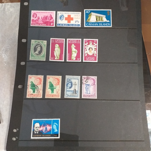 182 - Cayman Islands small collection on 13 album pages / stock cards from early with KG5 values to 1/- KG... 