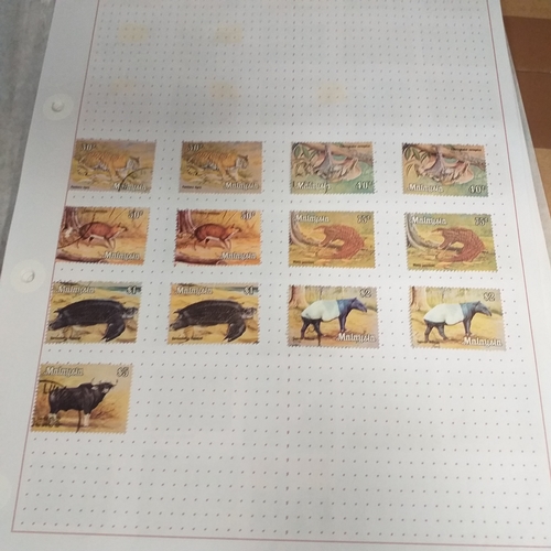 249 - Malaysia from 1970 to early 2000's collection on 30+ album sheets good selection of commemorative is... 