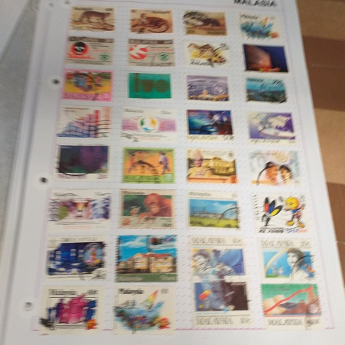 249 - Malaysia from 1970 to early 2000's collection on 30+ album sheets good selection of commemorative is... 