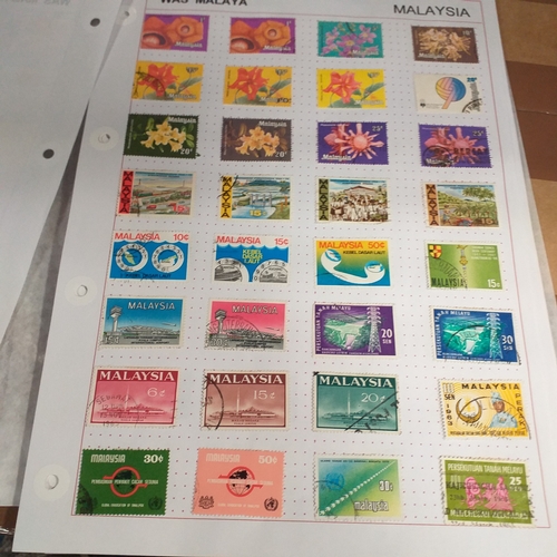 249 - Malaysia from 1970 to early 2000's collection on 30+ album sheets good selection of commemorative is... 