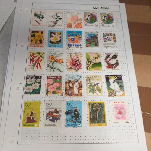 249 - Malaysia from 1970 to early 2000's collection on 30+ album sheets good selection of commemorative is... 