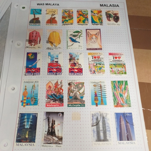 249 - Malaysia from 1970 to early 2000's collection on 30+ album sheets good selection of commemorative is... 
