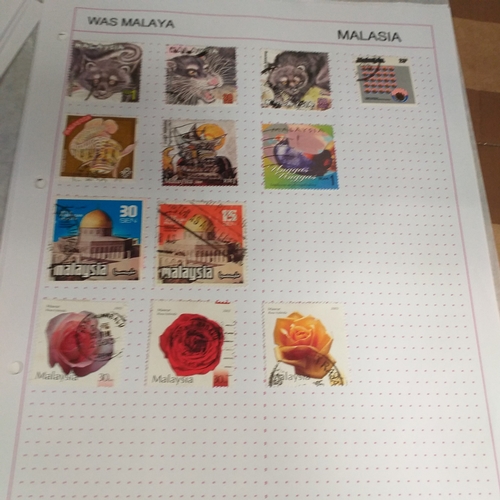 249 - Malaysia from 1970 to early 2000's collection on 30+ album sheets good selection of commemorative is... 