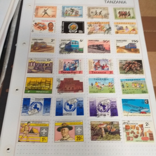 297 - Tanganika / Tanzania collection on 20+ album pages / stock cards, single sheet of KGV issues with va... 
