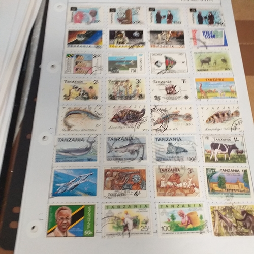 297 - Tanganika / Tanzania collection on 20+ album pages / stock cards, single sheet of KGV issues with va... 