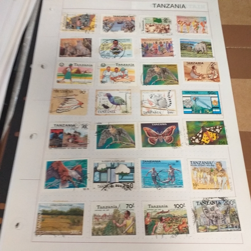 297 - Tanganika / Tanzania collection on 20+ album pages / stock cards, single sheet of KGV issues with va... 