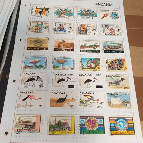 297 - Tanganika / Tanzania collection on 20+ album pages / stock cards, single sheet of KGV issues with va... 