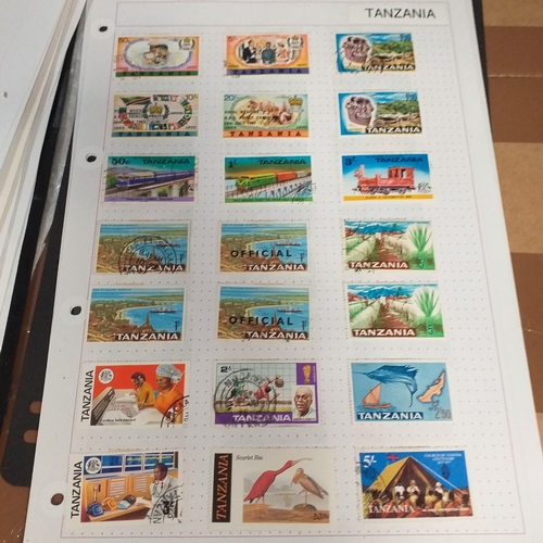 297 - Tanganika / Tanzania collection on 20+ album pages / stock cards, single sheet of KGV issues with va... 