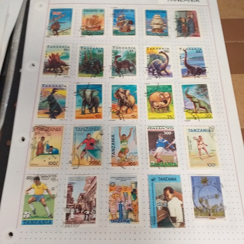 297 - Tanganika / Tanzania collection on 20+ album pages / stock cards, single sheet of KGV issues with va... 