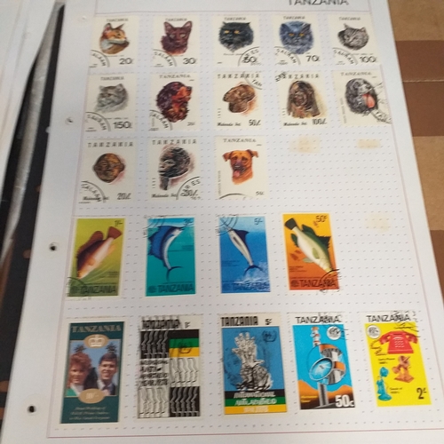 297 - Tanganika / Tanzania collection on 20+ album pages / stock cards, single sheet of KGV issues with va... 
