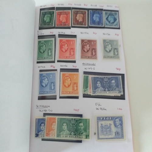 133 - Club book of un-mounted mint KGVI material, mainly UPU sets, plus defins from Bahamas, British Solom... 