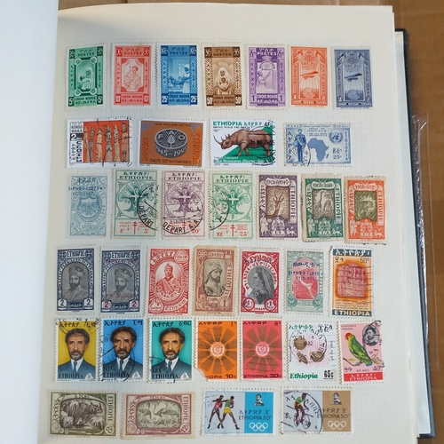 135 - African countries on approx 100 pages in a Devon Album.