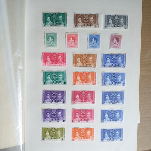 139 - Omnibus - 1937 Coronation - Mint collection on 10 album pages,apart from the Newfoundland set (14) l... 