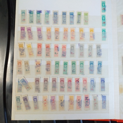 150 - An A5 size 8/16 page/side stock book of East German Trade Union Revenues - an unusual lot,.