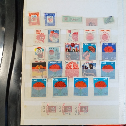 150 - An A5 size 8/16 page/side stock book of East German Trade Union Revenues - an unusual lot,.