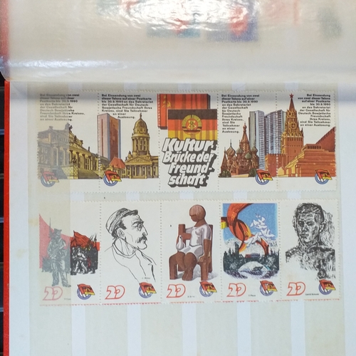 150 - An A5 size 8/16 page/side stock book of East German Trade Union Revenues - an unusual lot,.