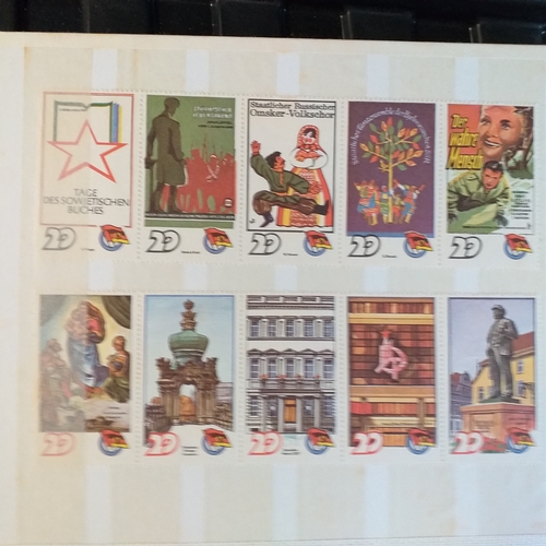 150 - An A5 size 8/16 page/side stock book of East German Trade Union Revenues - an unusual lot,.