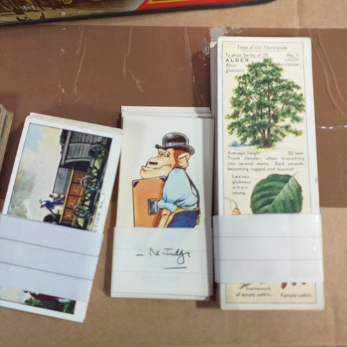 67 - Tin of Trade sets, 20 in all VG/Exc condition Cat Val 300