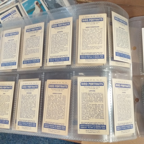 69 - TradeCards - 9 different part sets in leaves VG/Exc condition Cat Val 225