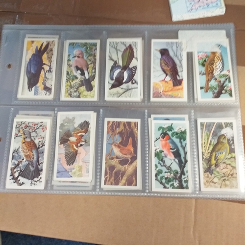 69 - TradeCards - 9 different part sets in leaves VG/Exc condition Cat Val 225