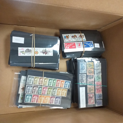 35 - Box containing a large accumulation of Germany related material - large stock book with issues from ... 