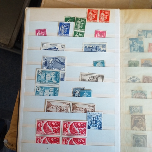 140 - Small 8 page/16 side blue stock book with a selection of odds & sods - early US, GB 2 x embossed iss... 