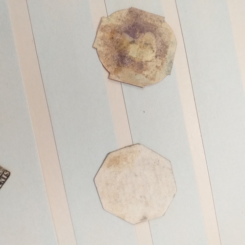 140 - Small 8 page/16 side blue stock book with a selection of odds & sods - early US, GB 2 x embossed iss... 