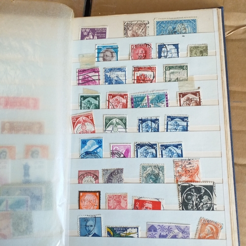 140 - Small 8 page/16 side blue stock book with a selection of odds & sods - early US, GB 2 x embossed iss... 