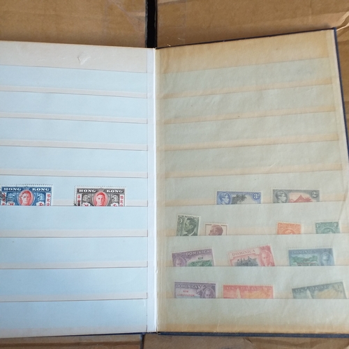 140 - Small 8 page/16 side blue stock book with a selection of odds & sods - early US, GB 2 x embossed iss... 