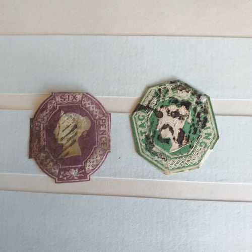 140 - Small 8 page/16 side blue stock book with a selection of odds & sods - early US, GB 2 x embossed iss... 